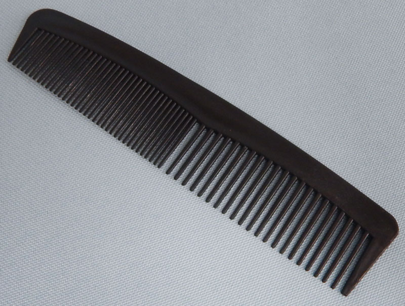 black plastic short comb